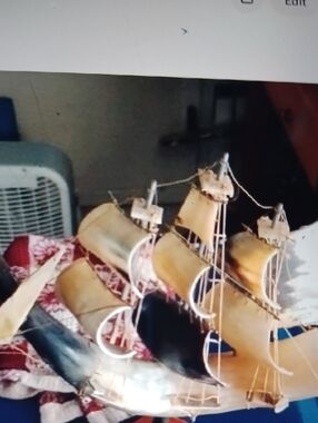 Wooden Three-Masted Model Ship with Natural and Dark Sails